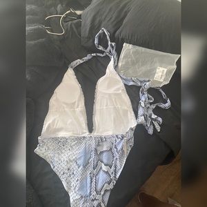 Snake print. Sky blue sexy swimsuit